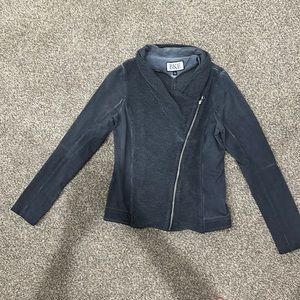 Buckle across zip shirt/coat.